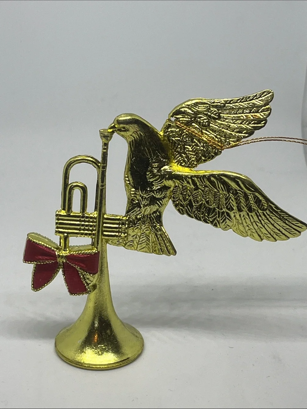 Vintage Gold Flying Dove with Trumpet Holiday Ornament with Red Bow